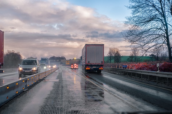 trucks in rain